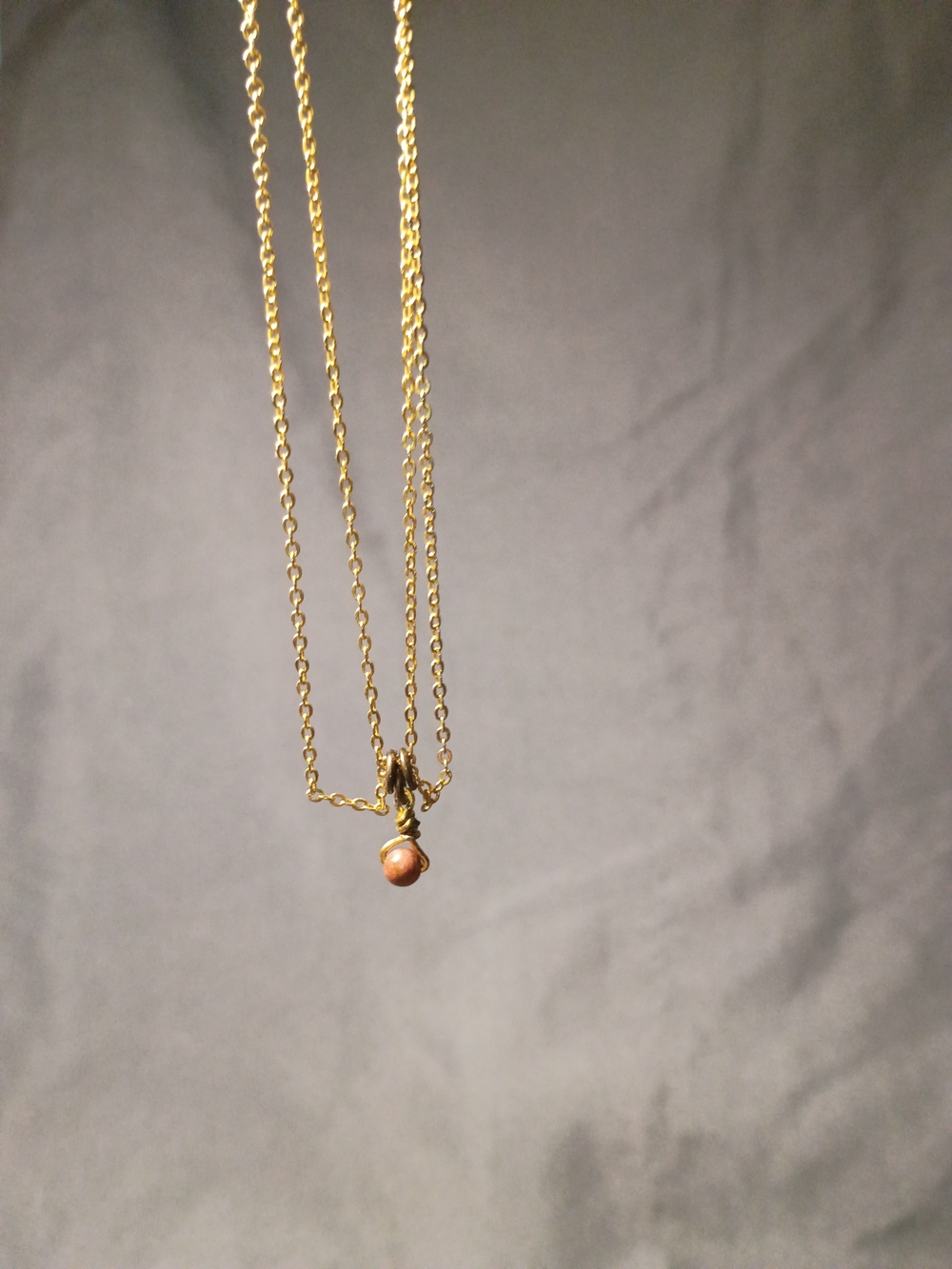 Delicate Gold-Tone Necklace with Pink Pearl Pendant